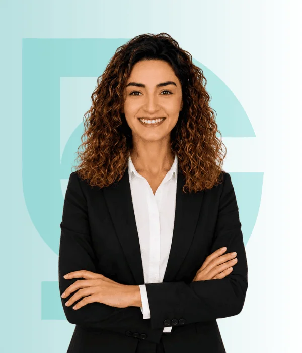 Yaren Kaya smiling in professional attire at Acibadem Hospital.