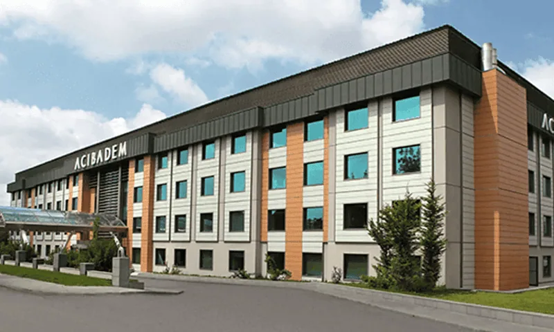Acibadem Hospitals Group building exterior, showcasing modern healthcare facility in a professional.