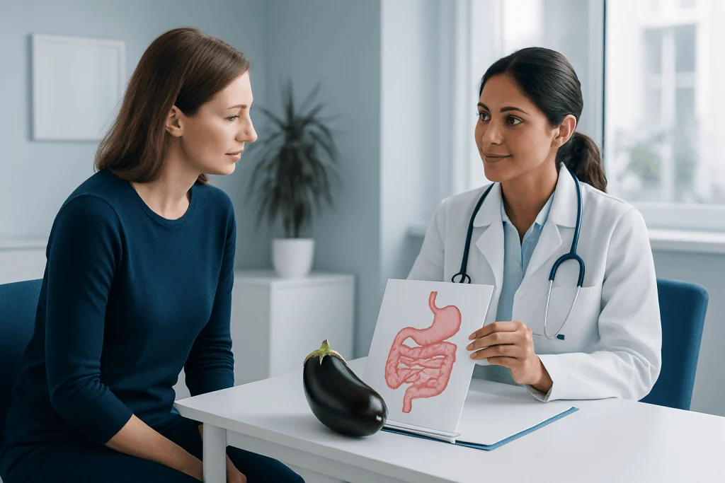 Doctor explaining digestive system to patient in a consultation room.