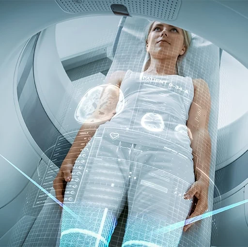 A patient lying in an MRI scanner with a digital overlay of body regions, illustrating whole-body MRI screening