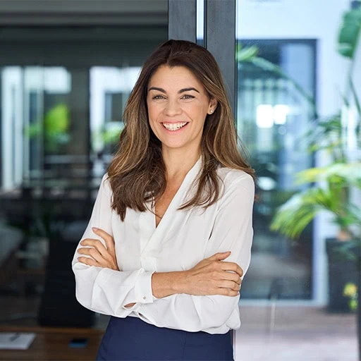 A woman standing in a bright modern office — illustration for Acibadem's women's health check-up programmes